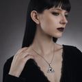 The Crimson Triquetra Pendant